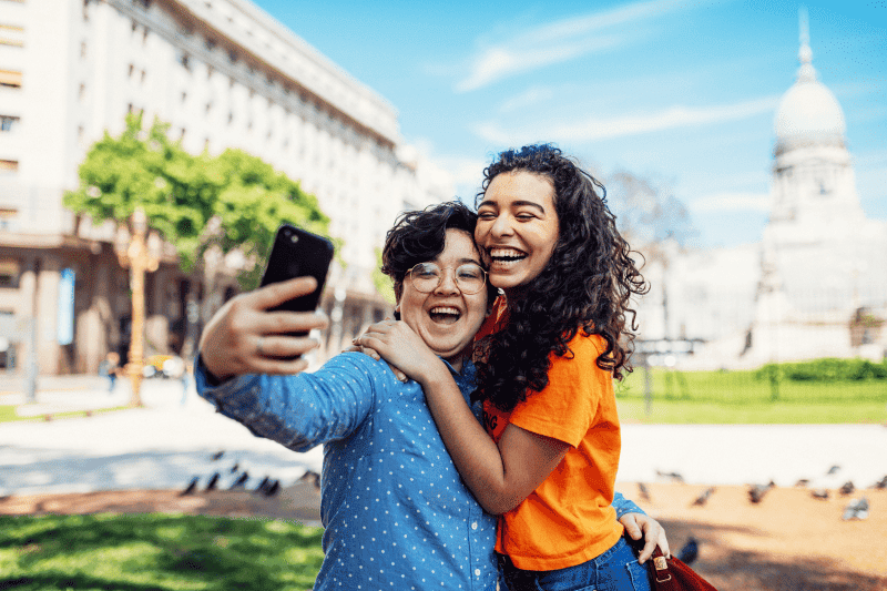 Two people taking a selfie