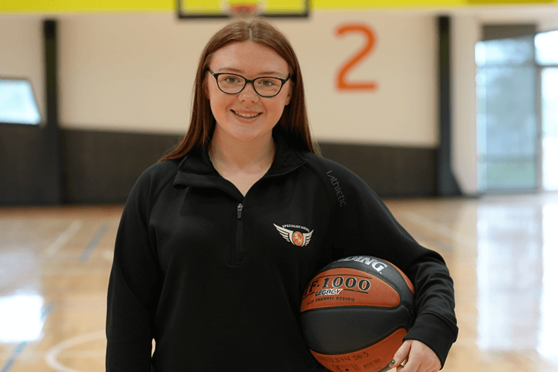 Emily Attard standing with basketball